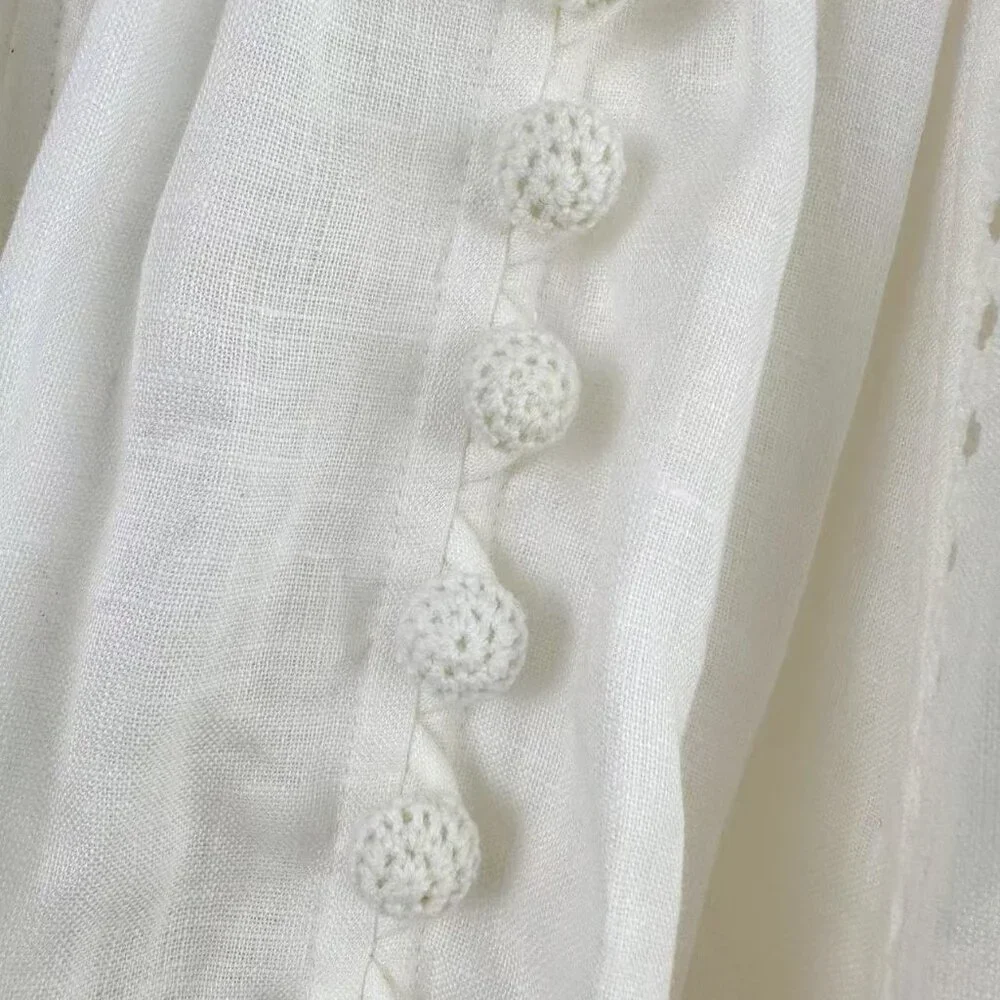 Romantic White Lace Dress: V - Neck, Puff Sleeves & Tiered Skirt - Picture 6 of 8